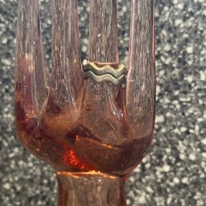 Rings to stackable silver in color but not real silver size 6.5